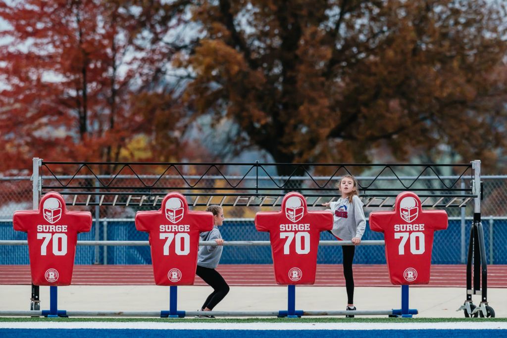 Feature - 1st place - Garaway's water girls practice dance moves during team warmups before the week 11 high school football playoff game against Rock Hill at Garaway High School in Sugarcreek. (Andrew Dolph / The Times Reporter)