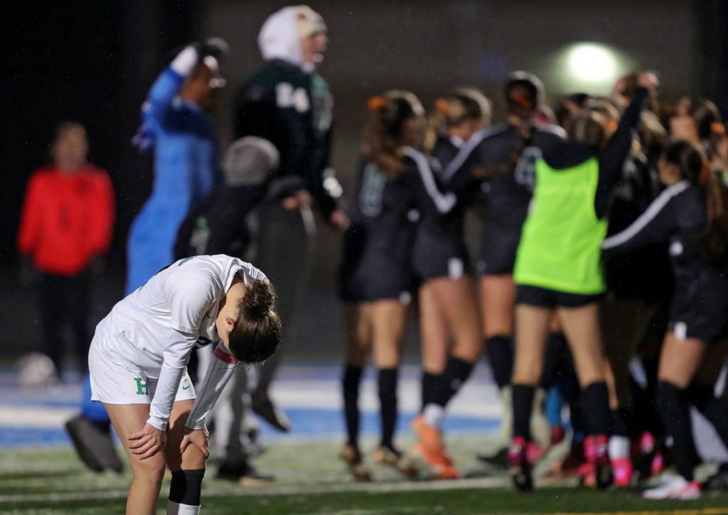 Sports Feature - HM - Highland’s Lauren Wetzel reacts after her kick was blocked by Strongsville goalkeeper Abby Kudla at the end of a Division I regional semifinal soccer match in Brunswick. (Jeff Lange / Akron Beacon Journal)