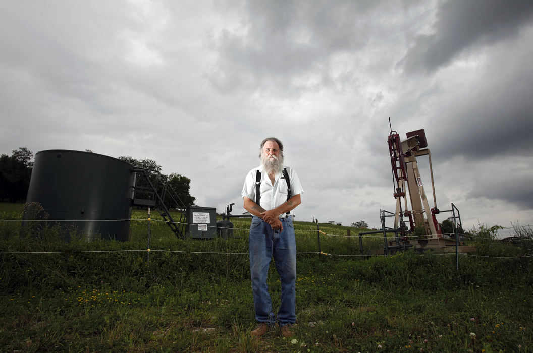 Portrait - 1st place - Terry Greenwood says gas drilling killed his livestock and ruined his 60-acre farm in the hills outside Daisytown in western Pennsylvania.  Greenwood said he knew there was an old gas lease on the farm when he bought it in 1988.  A former owner had signed with Peoples Natural Gas Co. in 1921. In 2007 a representative of Dominion Exploration and Production, stopped by to tell him that the company had purchased the 1921 lease and planned to drill two wells on his property. (Kyle Robertson / The Columbus Dispatch)