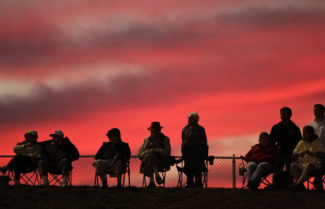 Feature - 3rd placeWittenberg fans watch from "The Hill" as the sun set over the Tigers' game against DePauw at Edwards-Maurer Field. (Barbara J. Perenic / Springfield News-Sun)