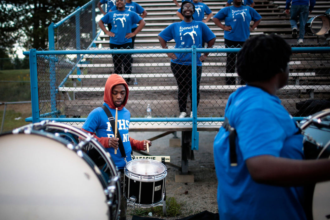 Feature - HMMifflin senior Kai Smith keeps time on his snare drum as the rest of the marching band enters the stands before Mifflin's football game against Watkins Memorial. (Joshua A. Bickel / ThisWeek Newspapers)