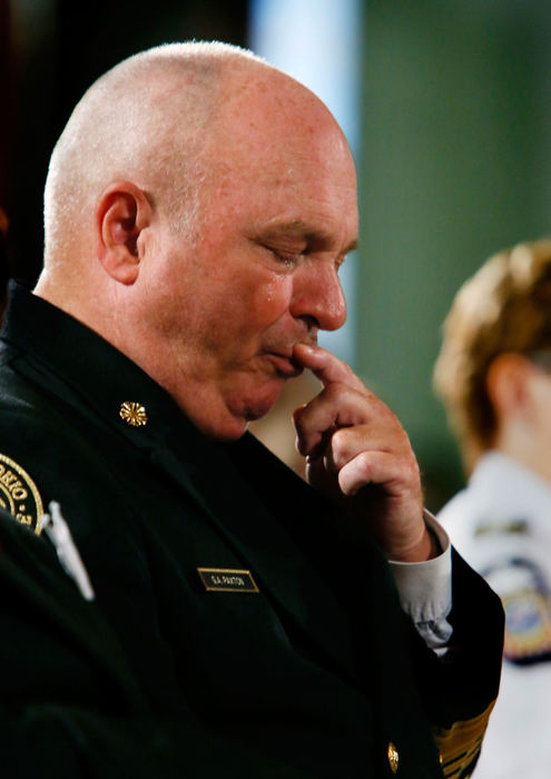 General News - 3rd placeColumbus fire chief Gergory Paxton in a moment of reflection at the 9/11 Remembrance Ceremony at Columbus City Hall . (Eric Albrecht / The Columbus Dispatch)