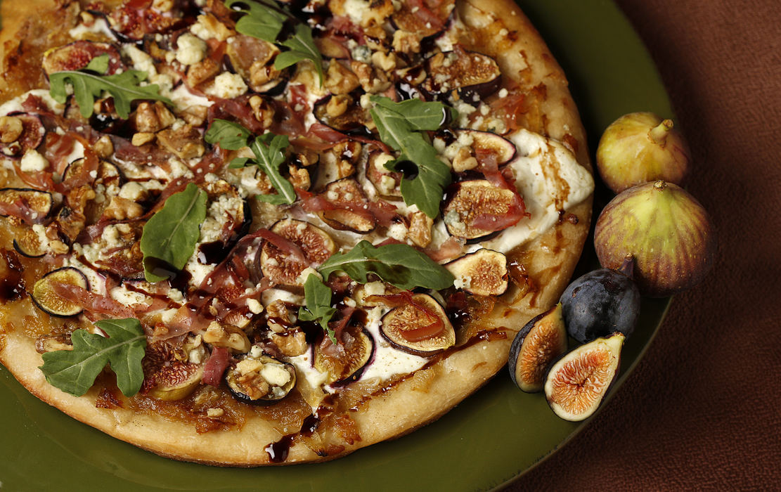 Illustration - 2nd place - Fresh figs add a sweet element to the savory tastes of pizza.  (Chris Russell / The Columbus Dispatch)