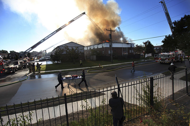 Spot News - 2nd place - The three alarm fire near Tamarack and Morse. (Tom Dodge / The Columbus Dispatch)