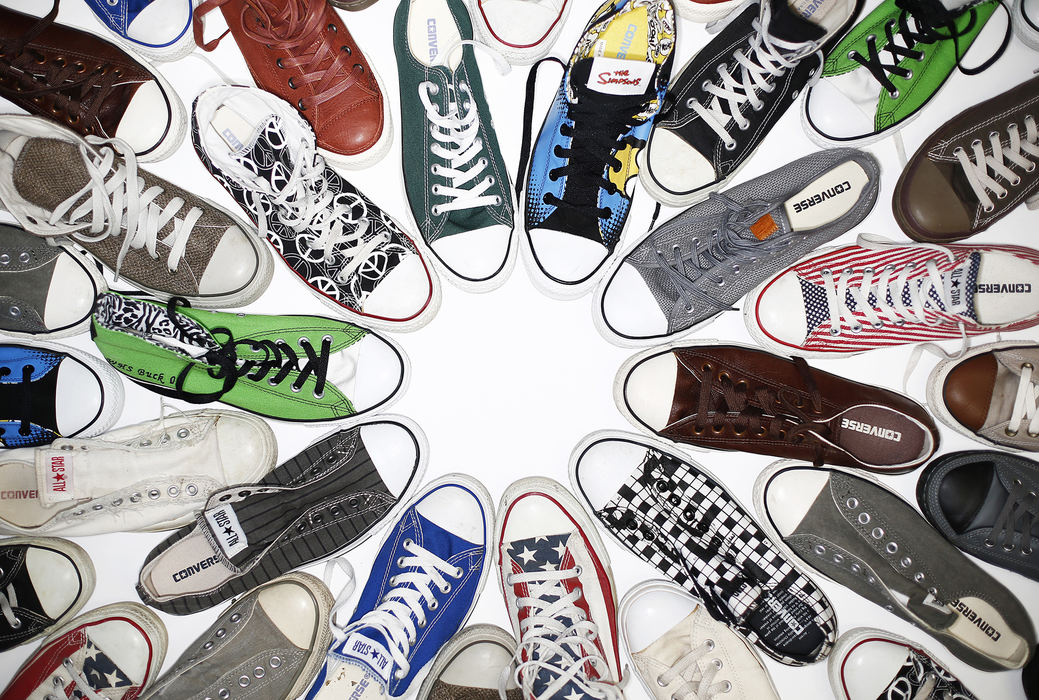 Illustration - 1st place - Some of the Converse Chuck Taylor All-Star collection owned by Jack Buckingham. July 28th marked the debut of the Chuck Taylor All Star II, the first redesign of the original in 98 years.  (Eamon Queeney / The Columbus Dispatch)