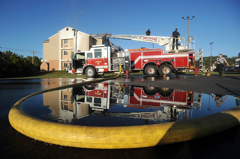 Spot News - 2nd place - Zanesville Fire Department and Falls and Washington townships fought a fire at the Fairfield Inn in Zanesville. (Chris Crook / Zanesville Times Recorder)