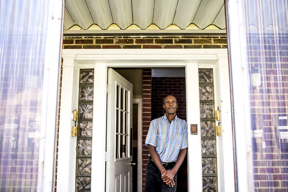 Portrait - 2nd place - James McLean, 54, poses for a portrait in his Golf Manor home. McLean has been unemployed for eleven months and spends hours everyday looking and applying for jobs.  (Meg Vogel / Cincinnati Enquirer)