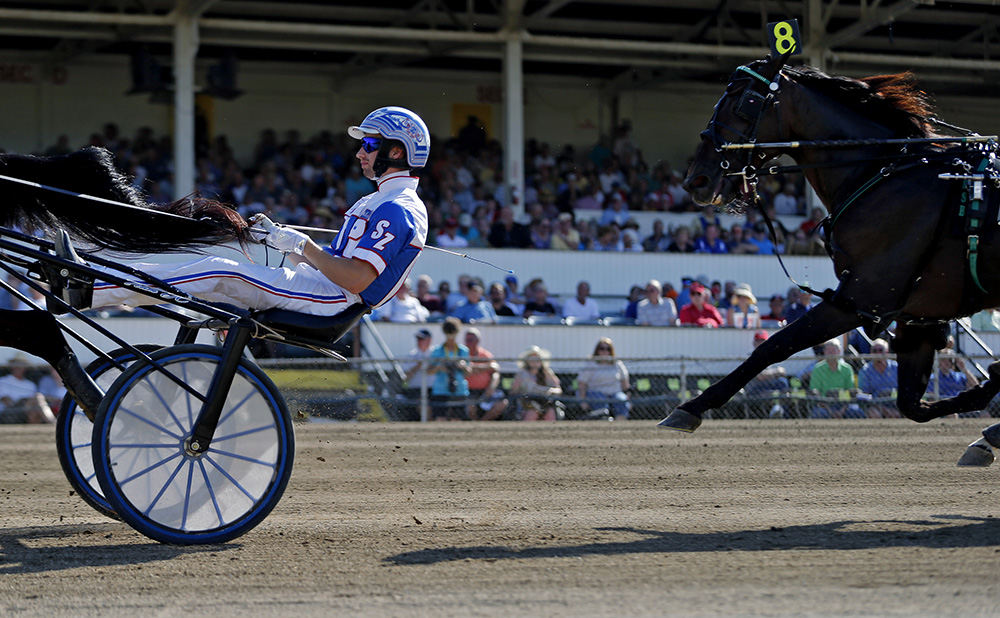 Story - 2nd place - Scott Zeron driving Sliding Home gets a head of Jack Vernon driven by Matt Kakaley during the 11th race at the 71st Little Brown Jug in Delaware, Ohio. (Kyle Robertson / The Columbus Dispatch)