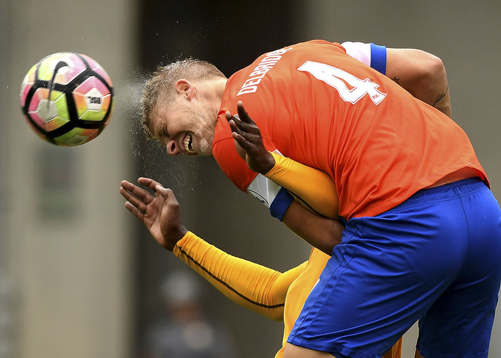 Sports - 2nd place - FC Cincinnati's Harrison Delbridge wins a header against a Pittsburgh River Hound defender. The teams battled to a 1-1 draw  at Nippert Stadium in Cincinnati. (Erik Schelkun / Elsestar Images)