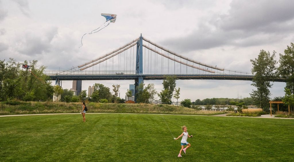 Feature - 3rd place - Isla Antonello, 5, flies a kite along with her mother Brittany Antonello at Middlegrounds Metropark in Toledo. (Jeremy Wadsworth / The Blade)