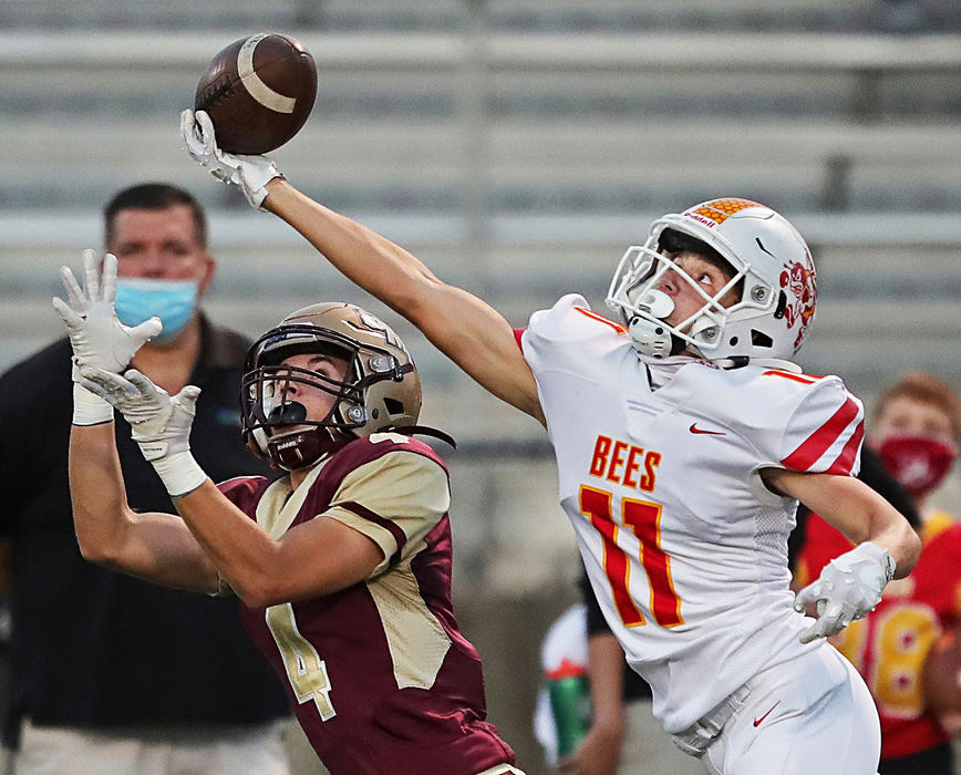 Sports - 3rd place - Brecksville cornerback Trey Green (right) nearly intercepts a pass intended for Stow receiver William Luketich during the first half of a game at Stow High School.(Jeff Lange / Akron Beacon Journal)