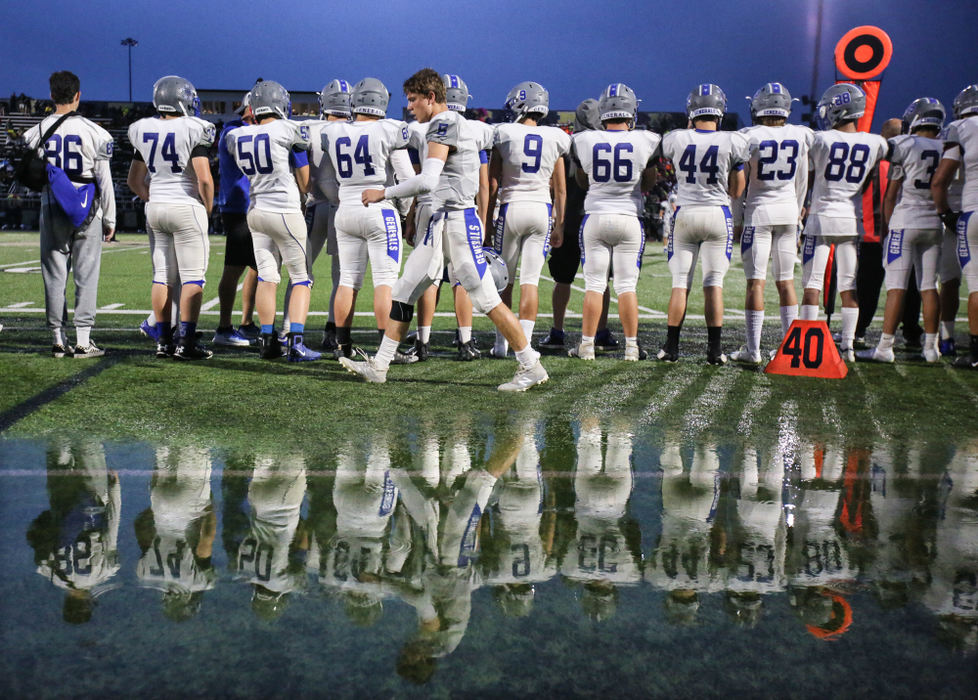 Sports Feature - 3rd placeAnthony Wayne quarterback Mason Alberts (5) walks the rain soaked sidelines during a game against Perrysburg.  (Jeremy Wadsworth / The Blade)