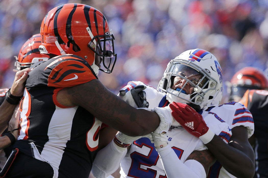 Sports - 1st placeCincinnati Bengals offensive tackle Bobby Hart (68) and Buffalo Bills free safety Jordan Poyer (21) exchange shoves after a play in the second quarter at New Era Stadium in Buffalo. (Sam Greene / The Cincinnati Enquirer)