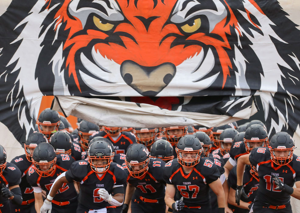 Sports Feature - HM - Liberty Center players run out ahead of a high school football game against Otsego at Liberty Center High School in Liberty Center. (Kurt Steiss / The Blade)