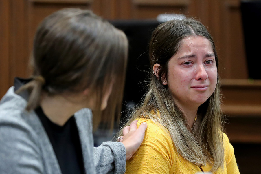 General News - 3rd place - Tears stream down the face of defendant Sydney Powell as she is comforted by paralegal Marie DiCola while her attorney Don Malarcik goes over the timeline of events leading up to the killing of her mother, Brenda, during opening statements in the courtroom of Summit County Common Pleas Court Judge Kelly McLaughlin. (Jeff Lange / Akron Beacon Journal)