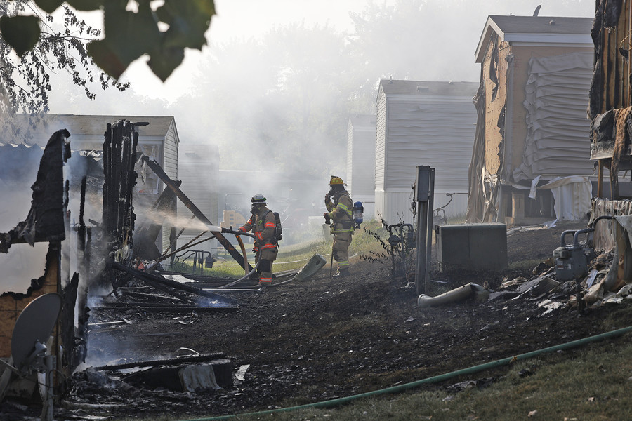 Spot News - HM - Two mobile homes were destroyed by a fire and four others severly damaged at the Honey Creek Mobile Home Park in Pike Township. Fire crews from six surrounding departments responded to the blaze. The arrived to find one mobile home fully involved and another partially involved. There were no injuries reported from the fire.  (Bill Lackey / Springfield News-Sun)