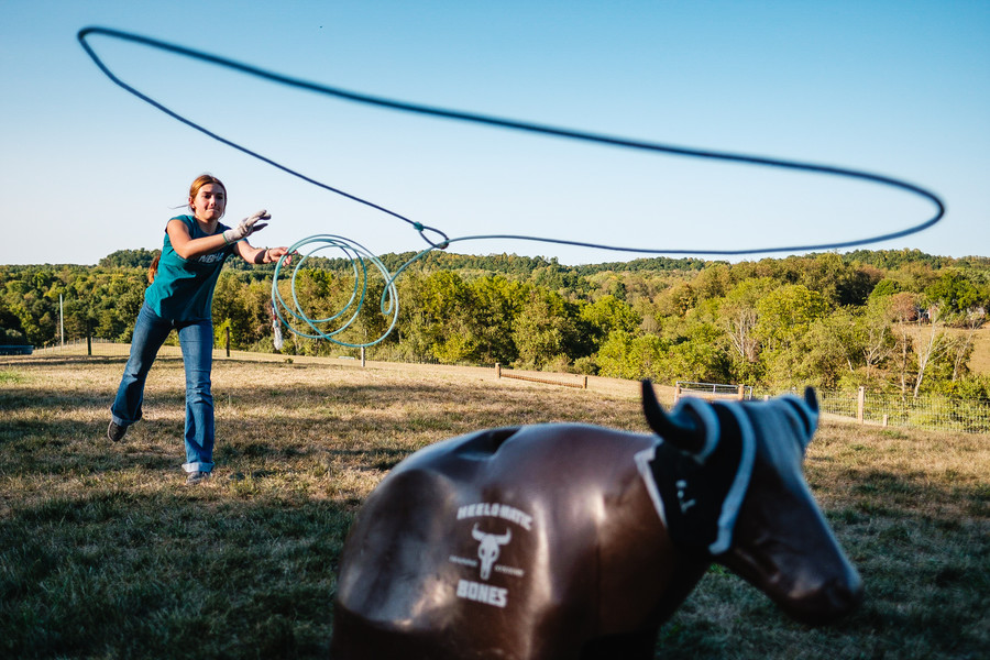 Feature - 2nd place - Cassie Miceli, 16, practices ground roping at her family home in Dover Township. Miceli will be participating in multiple events at this year’s Tuscarawas County Fair, in Dover. (Andrew Dolph / The Times Reporter)