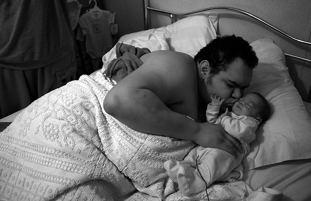 First place, Larry Fullerton Photojournalism Scholarship - Lindsay Steiner / Ohio UniversityRicky lives with Casi and Isabella at Casi's grandparent's house.  Casi and Ricky hope to get a home of their own after they graduate and get married. 