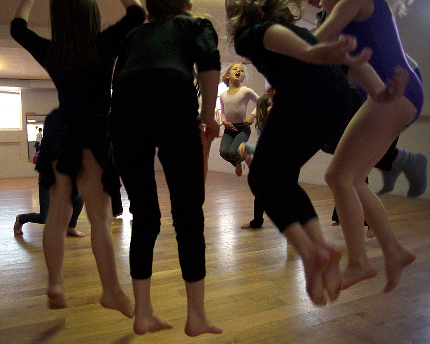 First place, Larry Fullerton Photojournalism Scholarship - Lindsay Steiner / Ohio UniversityEmily Brown, 7, develops her movement skills by jumping during a technique class at Factory Street Studio in Athens. 