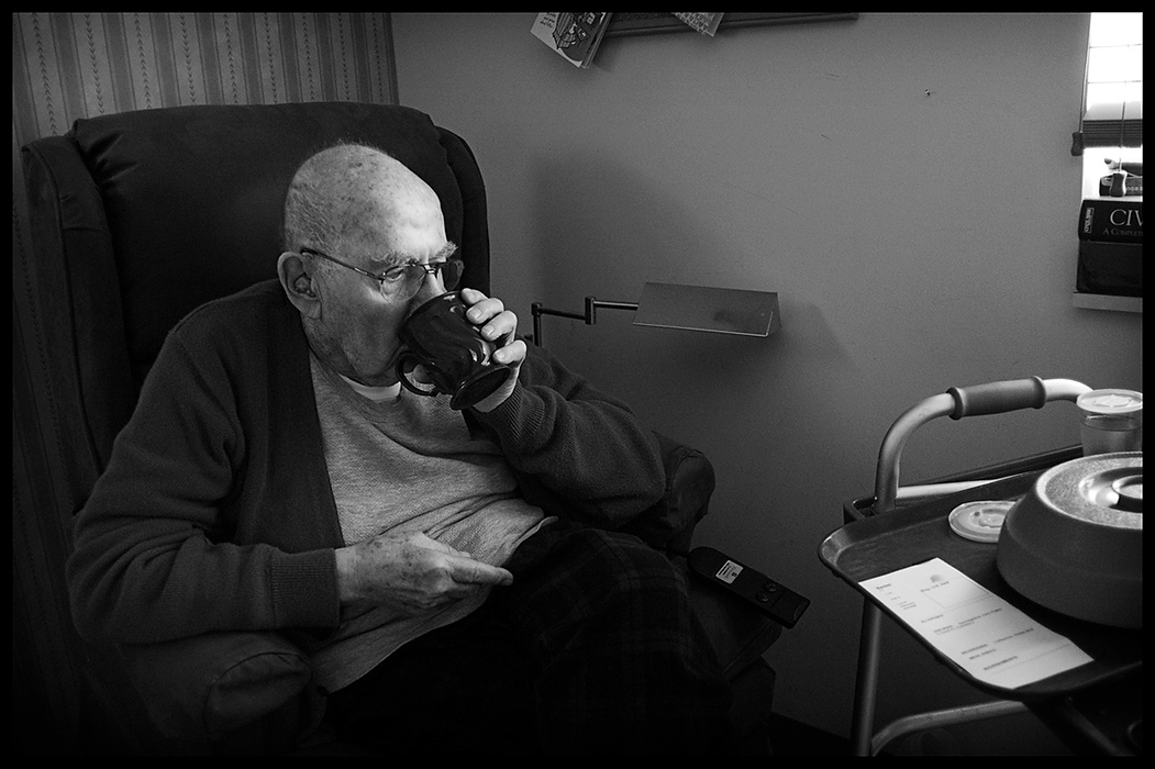Larry Fullerton Photojournalism Scholarship - James Roh / Ohio UniversityEd Barber, 84, takes a break from reminiscing of his past to take a sip from his coffee cup in Westerville.  Currently living in a nursing home in Westerville, Ohio, Barber tells of his childhood, his involvement in World War II, his children, and past marriages.  After taking a sip, Barber comments on the fact that he has not had a hot cup of coffee since living in the home, “Always just warm, never hot.” 