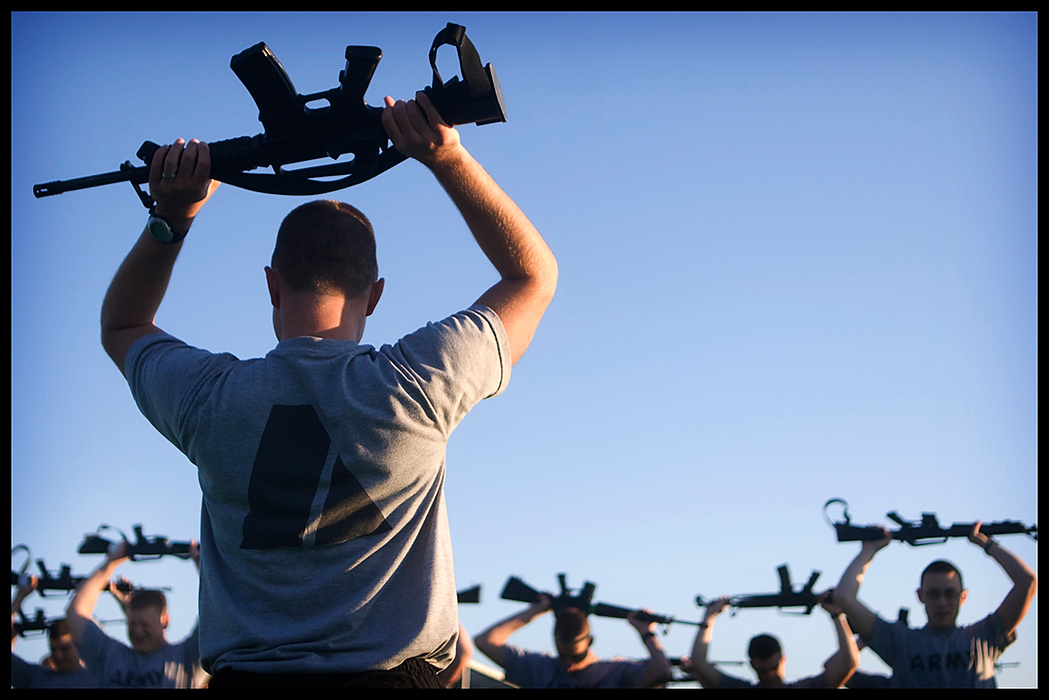 Larry Fullerton Photojournalism Scholarship - James Roh / Ohio UniversityDavid Karnosky, 25, a graduate student at Ohio University, leads Ohio University’s Reserve Officers Training Corps (ROTC) cadets through an exercise involving fake M16 guns at OU’s Goldsberry track and field stadium in Athens.  Cadets meet three times a week at six thirty in the morning to train and exercise.  “I like the commradery amongst the cadets,” said Karnosky.