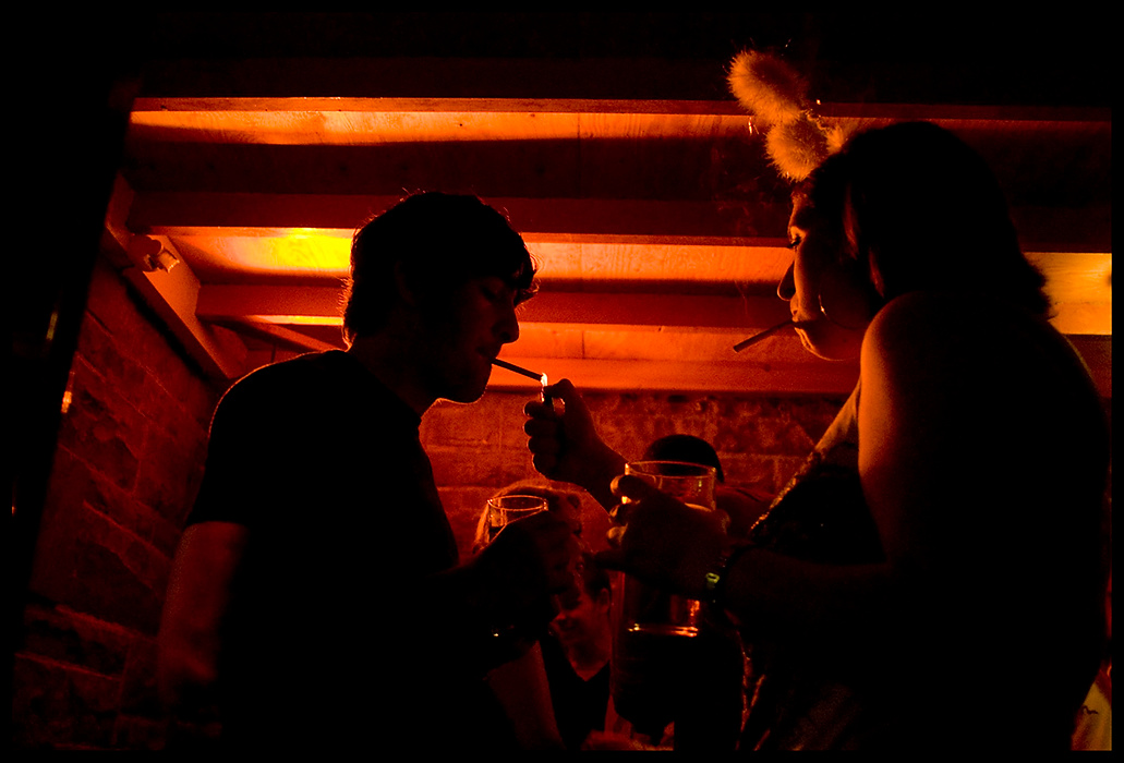 Larry Fullerton Photojournalism Scholarship - James Roh / Ohio UniversityHotel Ormidale disco goers take a break to smoke a cigarette in Brodick.