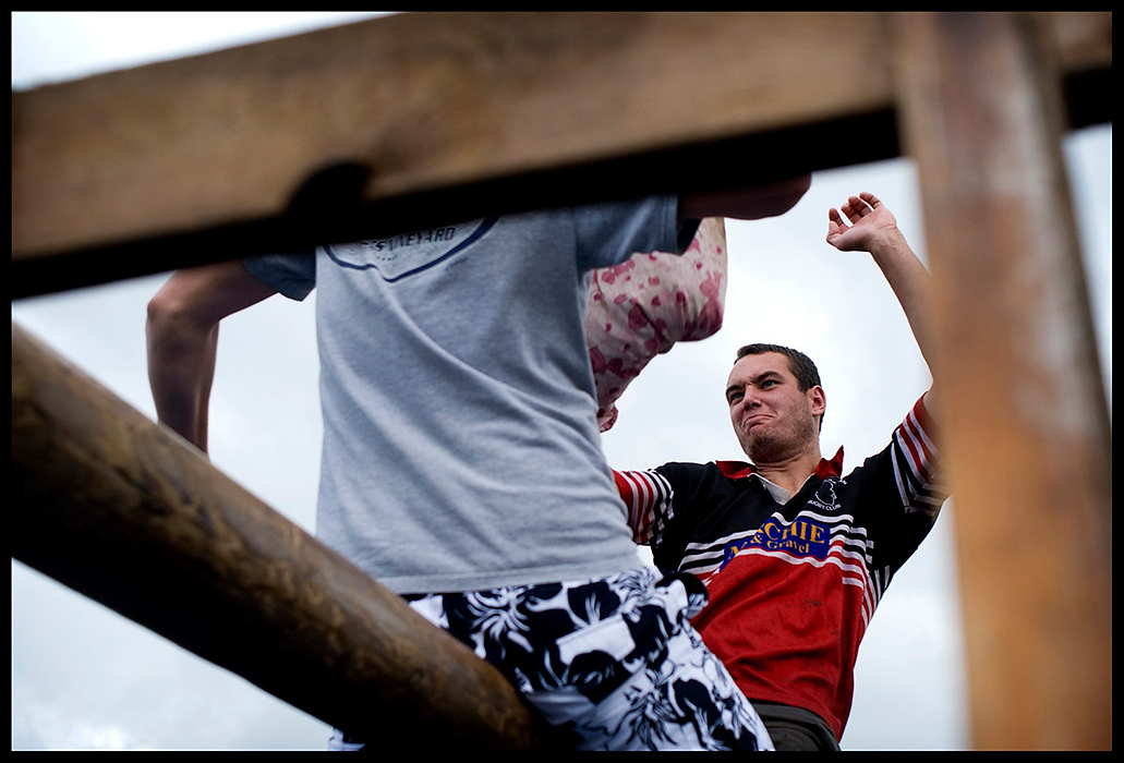 Larry Fullerton Photojournalism Scholarship - James Roh / Ohio UniversityMarc Whetton (facing) battles Cameron Ribbeck in the pillow fight competition at the 2008 Brodick Highland Games in Brodick.  Ribbeck won the match and the tournament for the third year in a row.
