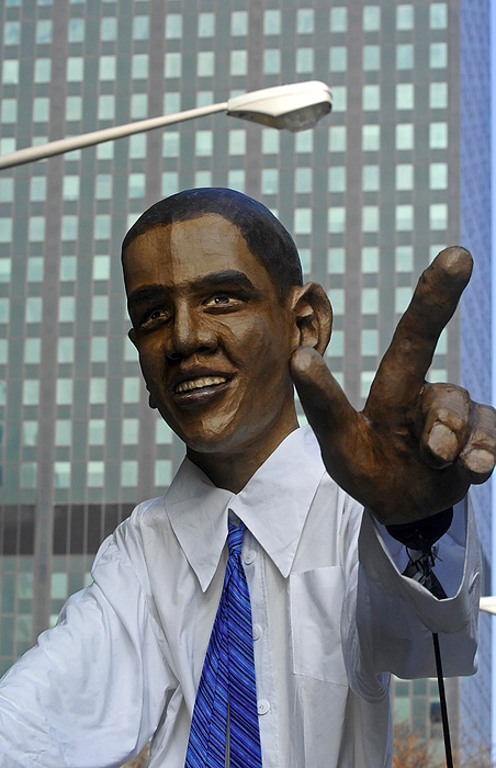 Larry Fullerton Photojournalism Scholarship - Laura Torchia / Kent State UniversityA Giant papier mache puppet of Barack Obama makes its way down 9th Street.  The puppet is held up and manipulated by a man walking through the crowd of thousands hoping to catch a glimpse of Democratic Presidential Candidate Barack Obama in Cleveland.