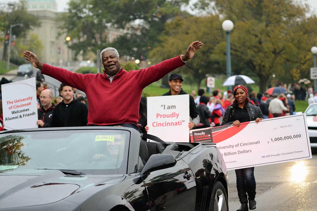 Second Place, Larry Fullerton Photojournalism Scholarship - Madison Schmidt / University of CincinnatiOscar Robertson, Naismith Memorial Basketball Hall of Famer and former player for the University of Cincinnati, joins UC staff, students and alumn in the annual homecoming day parade.