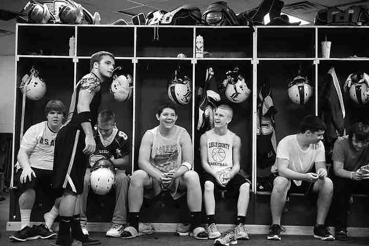 First place, Larry Fullerton Photojournalism Scholarship - Jenna Watson / Kent State UniversityIn the minutes before taking the field, players scatter through the locker room getting in the right mindset, whether it's with horseplay or a quiet conversation with a teammate. 