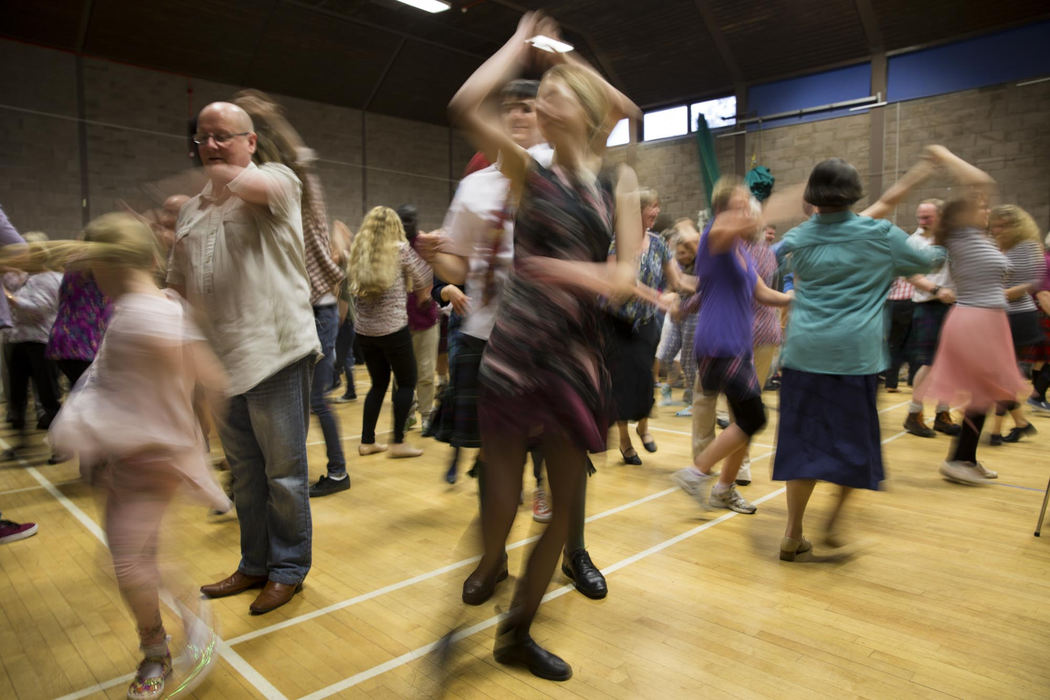 Second place, Larry Fullerton Photojournalism Scholarship - Alex Driehaus / Ohio UniversityParticipants learn traditional Scottish country dances during the Linlithgow Scotch Hop in Stirling, Scotland. Many people who come to the Scotch Hop are tourists from around the world visiting Scotland.