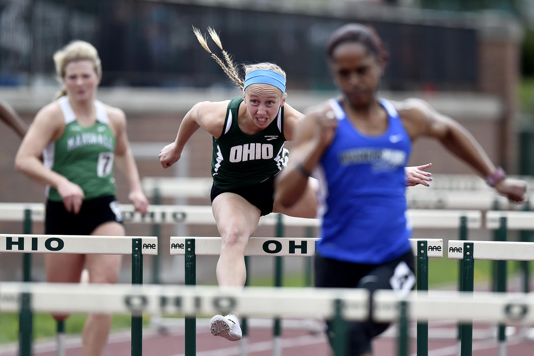 First place, Larry Fullerton Photojournalism Scholarship - Sarah Stier / Ohio UniversityAn Ohio University runner competes in the 100-meter hurdle event at Ohio's annual Cherry Blossom Invitational in Athens. 