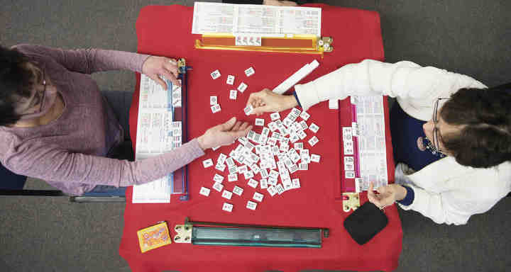 Third place, , Larry Fullerton Photojournalism Scholarsahip - Alexandria Skowronski / Ohio UniversityRita Suchanek (left) and Linda Thede from Aurora play Mahjong in the Aurora Recreation Center Seniors Room.  Mahjong is a tile based Chinese game and it very popular among Jewish ladies and the Chinese.  (Alexandria Skowronski/Ohio University)
