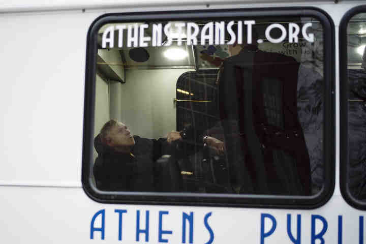 Third place, , Larry Fullerton Photojournalism Scholarsahip - Alexandria Skowronski / Ohio UniversityOfficers Andy Foster, Neal Dicken, and Ethan Doerr of Athens Police Department speak to a passenger of an Athens Transit bus who was in mental distress. The officers got the man calmed down and the bus was able to take him home.  (Alexandria Skowronski/Ohio University)
