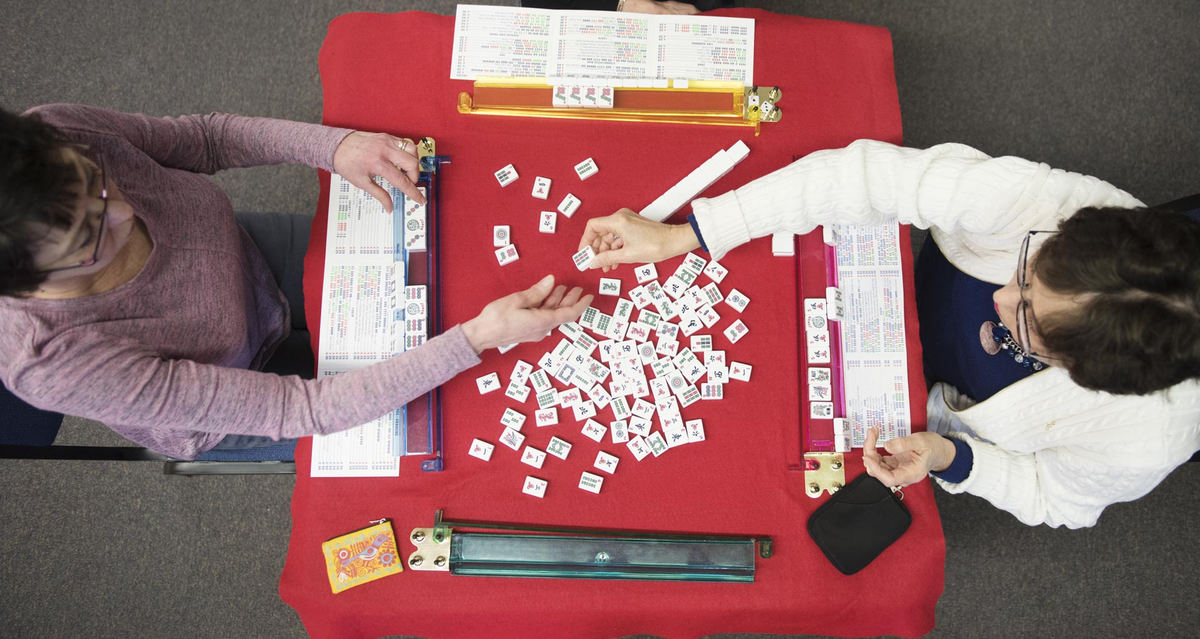 First Place, Larry Fullerton Photojournalism Scholarship - Alexandria Skowronski / Ohio UniversityRita Suchanek (left), Pat Steuer and Linda Thede all from Aurora, play Mahjong in the Aurora Recreation Center Seniors Room.  Mahjong is a tile based Chinese game and it very popular among Jewish ladies and the Chinese.