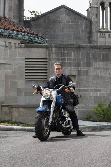 First Place - Larry Fullerton Photojournalism Scholarship , Tanner Pearson / Ohio UniversityFather Ethan Moore of McCartyville, Ohio poses for a portrait on his motorcycle on Sept. 14, 2020. Father Ethan has recently relocated from Dayton to Cincinnati to the University of Cincinnati Catholic Church, St. Monica St. George parish. 