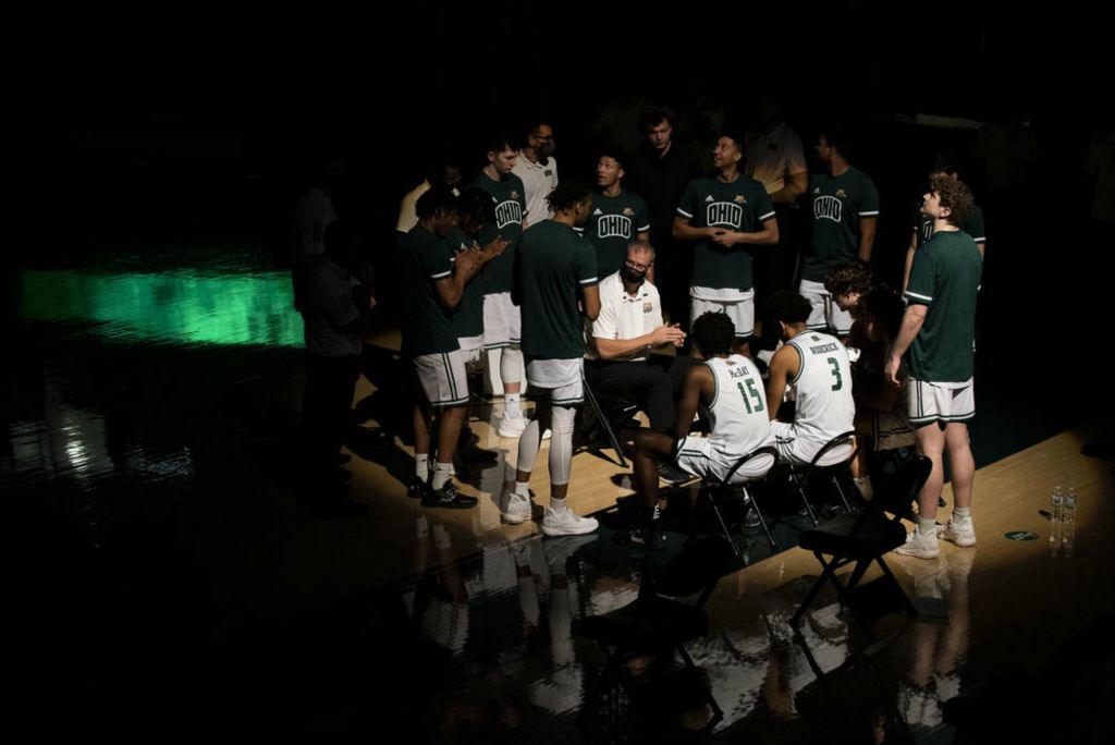 First Place - Larry Fullerton Photojournalism Scholarship , Tanner Pearson / Ohio UniversityOhio University head coach, Jeff Boals, hypes up the team before their game against Kent State on Jan. 16, 2021. Ohio University lost 89-79.