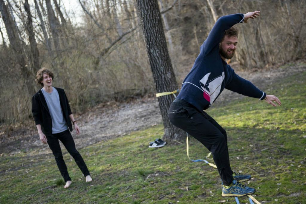 First Place - Larry Fullerton Photojournalism Scholarship , Tanner Pearson / Ohio UniversityNick Francis (left) and Matt Francis slackline at Pine Hill park in Mason, Ohio on March 17, 2020. Matt has been slacklining for five years and has introduced his brother, Nick to the sport two years ago.