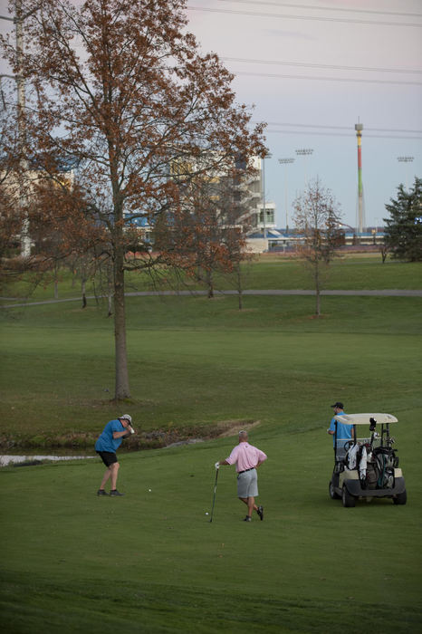 First Place - Larry Fullerton Photojournalism Scholarship , Tanner Pearson / Ohio UniversityGlenn Knight, Brian Grey and Ryan Najszak play golf at the City of Mason Golf Center on Nov. 9, 2020. The trio frequently plays at the golf course throughout the year. The golf course was designed by Jack Nicklaus and was originally named The Grizzly. Over the years it has also been known as The Kings Island Golf center. Mason purchased the course in 2015.