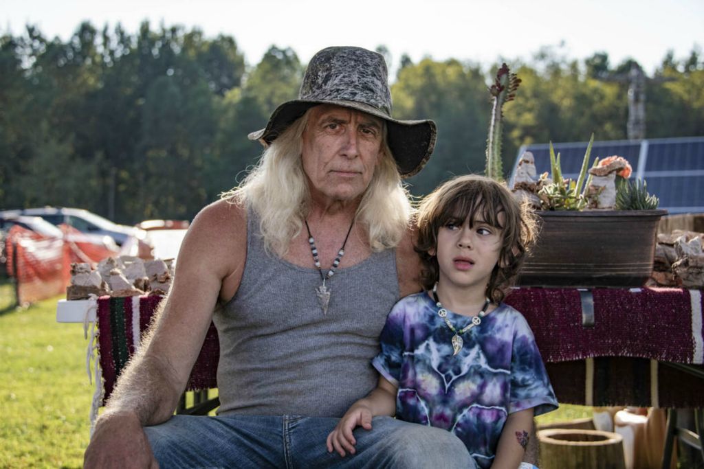 Second Place - Larry Fullerton Photojournalism Scholarship , Grace Wilson / Ohio UniversityRick Schwardt (left) and his grandson Levi Schwardt (right) at the Pawpaw Festival in Albany, on Sept. 13, 2019.