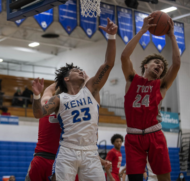 Second Place - Larry Fullerton Photojournalism Scholarship , Grace Wilson / Ohio UniversityXenia's Isiah Hoyt, 23, blocks while Troy's Nicholas May, 24, on Dec. 9, 2020. Xenia goes on to beat Troy 62-56.