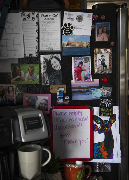 Second Place - Larry Fullerton Photojournalism Scholarship , Grace Wilson / Ohio UniversityArika and Landon Wilson's refrigerator full of notes and pictures. Arika writes notes to her son, Landon, each morning. Landon makes sure to keep her shopping list updated.