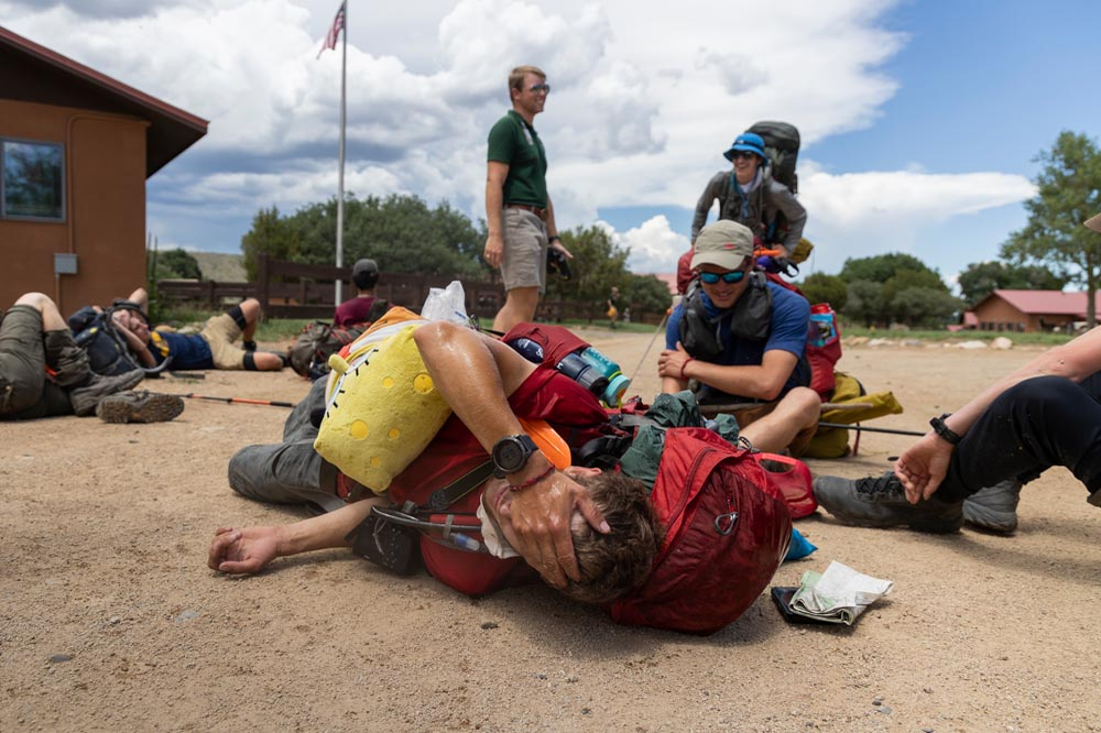 Zoe Cranfill / Ohio UniversityA Rayado member lays as he realizes he finished his 21 day trek at Phimont Scout Ranch in Cimarron, NM on July 9, 2022. 