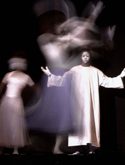 Award of Excellence, Assigned Feature - Jason Molyet  / Mansfield News JournalMembers of the Mime and Dance Troop "Messengers of God" of Lorain perform for students at Mansfield Senior  during the "Because I Can" program in honor of Black History Month.