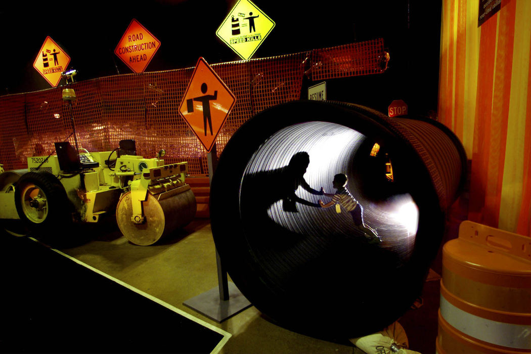 Award of Excellence, Enterprise Feature - Chris Russell / The Columbus DispatchJobe Curtis, 3, of Wilmington got a hands on experience with ODOT's interactive construction site display at the Ohio State Fair.  