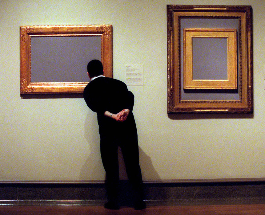 Award of Excellence, Enterprise Feature - Fred Squillante / The Columbus DispatchWhere's the art? Actually, the frame is the art in this display. Elizabeth Nash of Columbus takes a close look at a frame on display at the Columbus Museum of Art. The frames are part of the exhibit, The Frame in America:1860 - 1960, which focuses on one of the most prolific and creative periods of American frame design. 