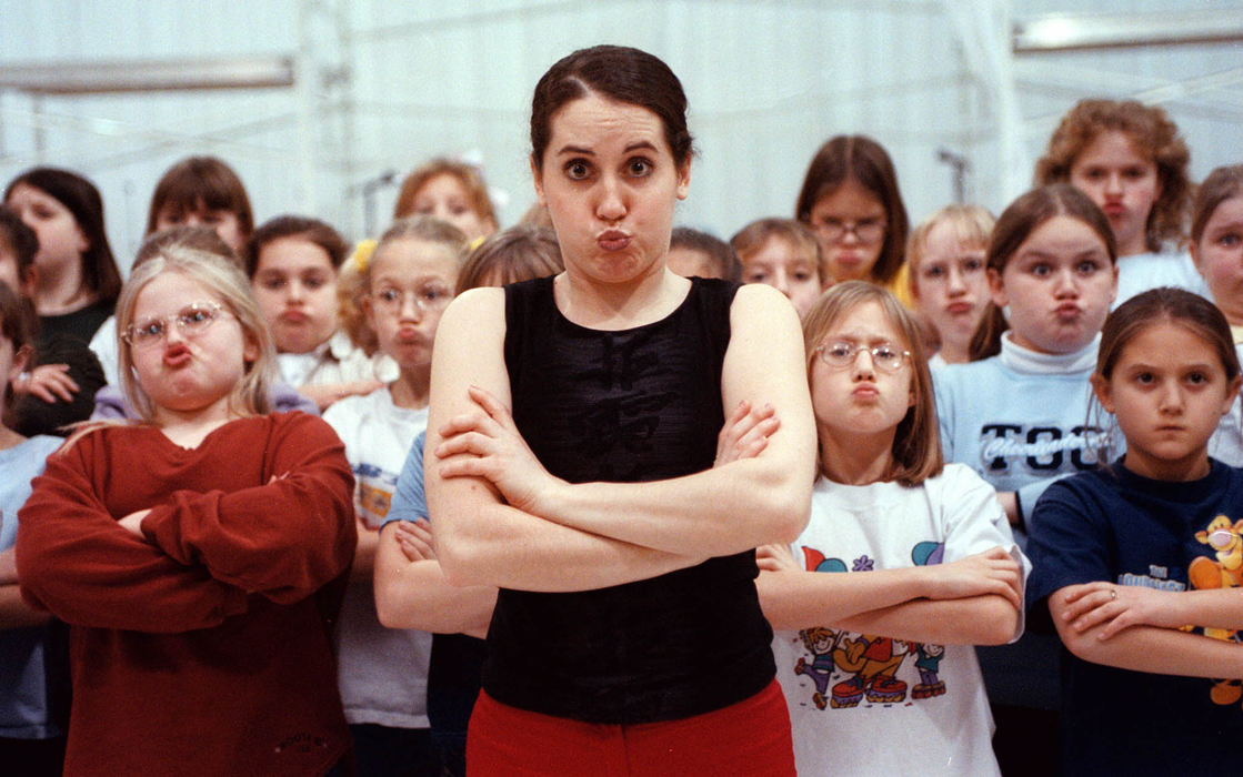 Award of Excellence, Enterprise Feature - Monique Ganucheau / The Medina GazetteMegan Luquire a member of The Young Americans leads 4th, 5th, and 6th grade girls at Cloverleaf High School in the Indians dance from "Peter Pan."  The girls are all making their best serious Indian Face.  