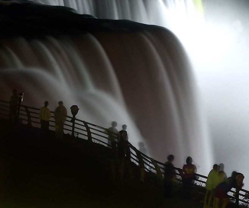 Award of Excellence, Enterprise Feature - Jim A. Laskay / Springfield News-SunSpectators at the American Falls in Niagara Falls, New York watch as the falls come to life.