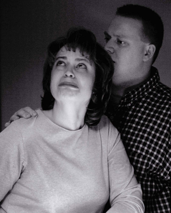 Award of Excellence, Feature Picture Story - Brandi Stafford / The Cincinnati EnquirerGina's husband Don comforts her as they watch the birth in a mirror above Alaina's bed. 