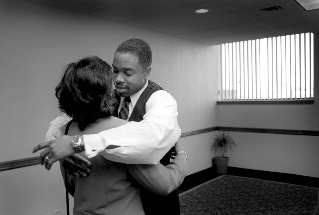 Award of Excellence, News Picture Story - Dale Omori / The Plain DealerCleveland mayoral candidate Raymond Pierce gets a hug and words of encouragement from his wife Diane, just before his City Club debate with opponent Jane Campbell at the downtown Sheraton Hotel.